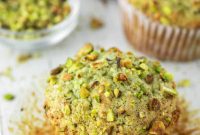 Fluffy Pistachio Muffins with Cream Cheese Frosting