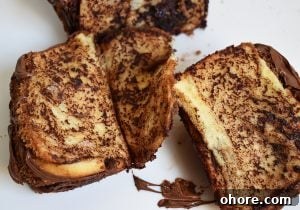 Nutella Pull-Apart Bread Recipe: Gooey Chocolate Hazelnut Loaf 2 Nutella bread slices on an white background.