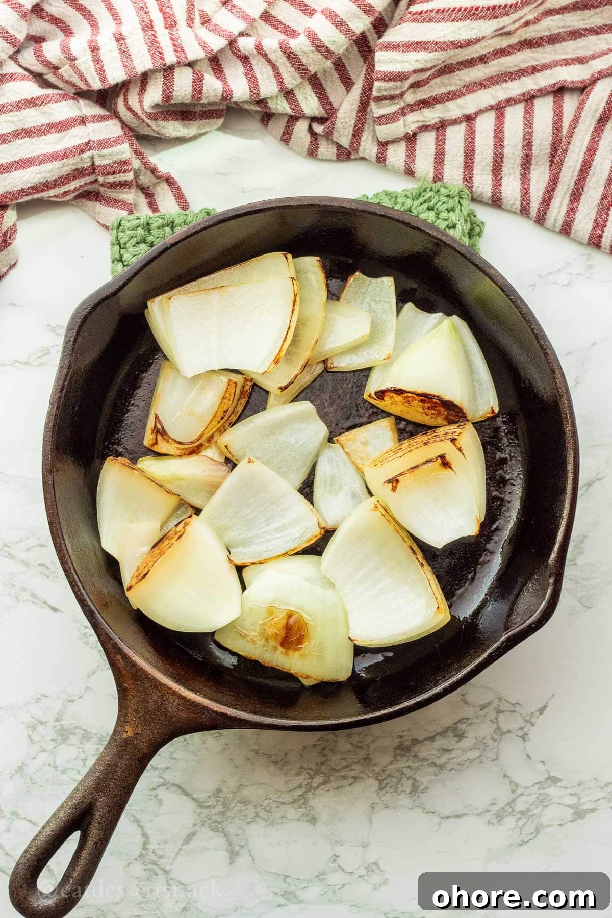 Homemade Instant Pot Chicken Bone Broth Recipe 5 Browned onions in frying pan.