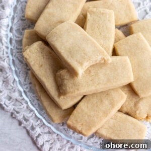 3-Ingredient Brown Sugar Cookies Recipe 14 plate of 3 Ingredient Brown Sugar Cookies with one with a bite missing