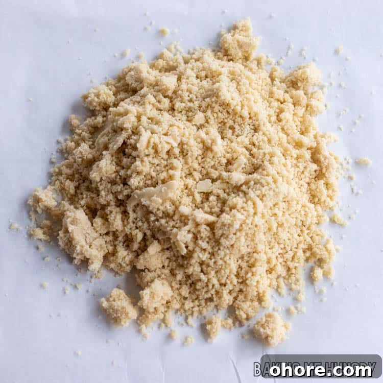 3-Ingredient Brown Sugar Cookies Recipe 6 dough on parchment that looks like wet sand
