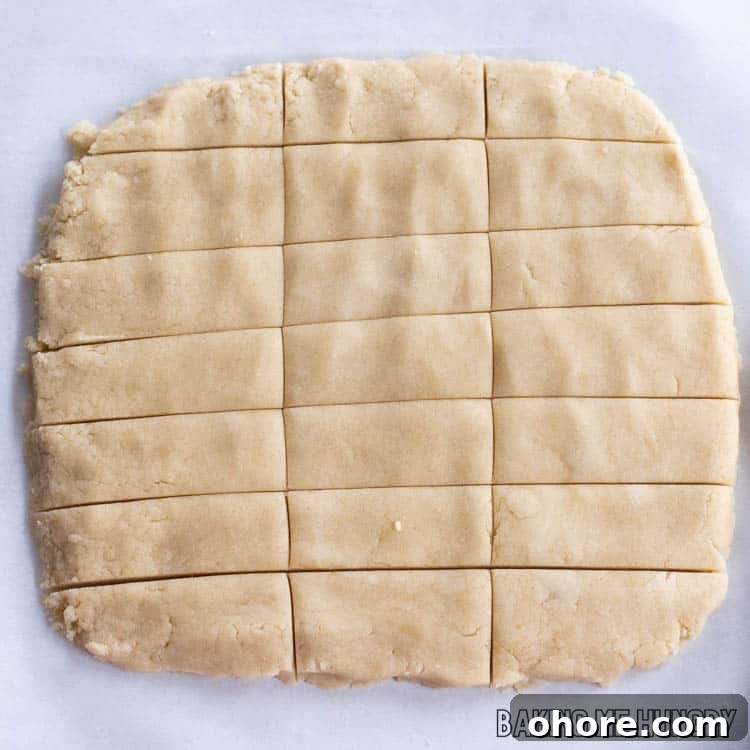 3-Ingredient Brown Sugar Cookies Recipe 8 a rectangle of dough cut into strips