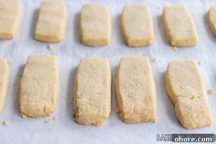 3-Ingredient Brown Sugar Cookies Recipe 10 baked plate of 3 Ingredient Brown Sugar Cookies on a parchment lined baking sheet