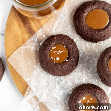 Chewy Dulce de Leche Sandwich Cookies 10 Chocolate thumbprint cookies with dulce de leche in the middles.