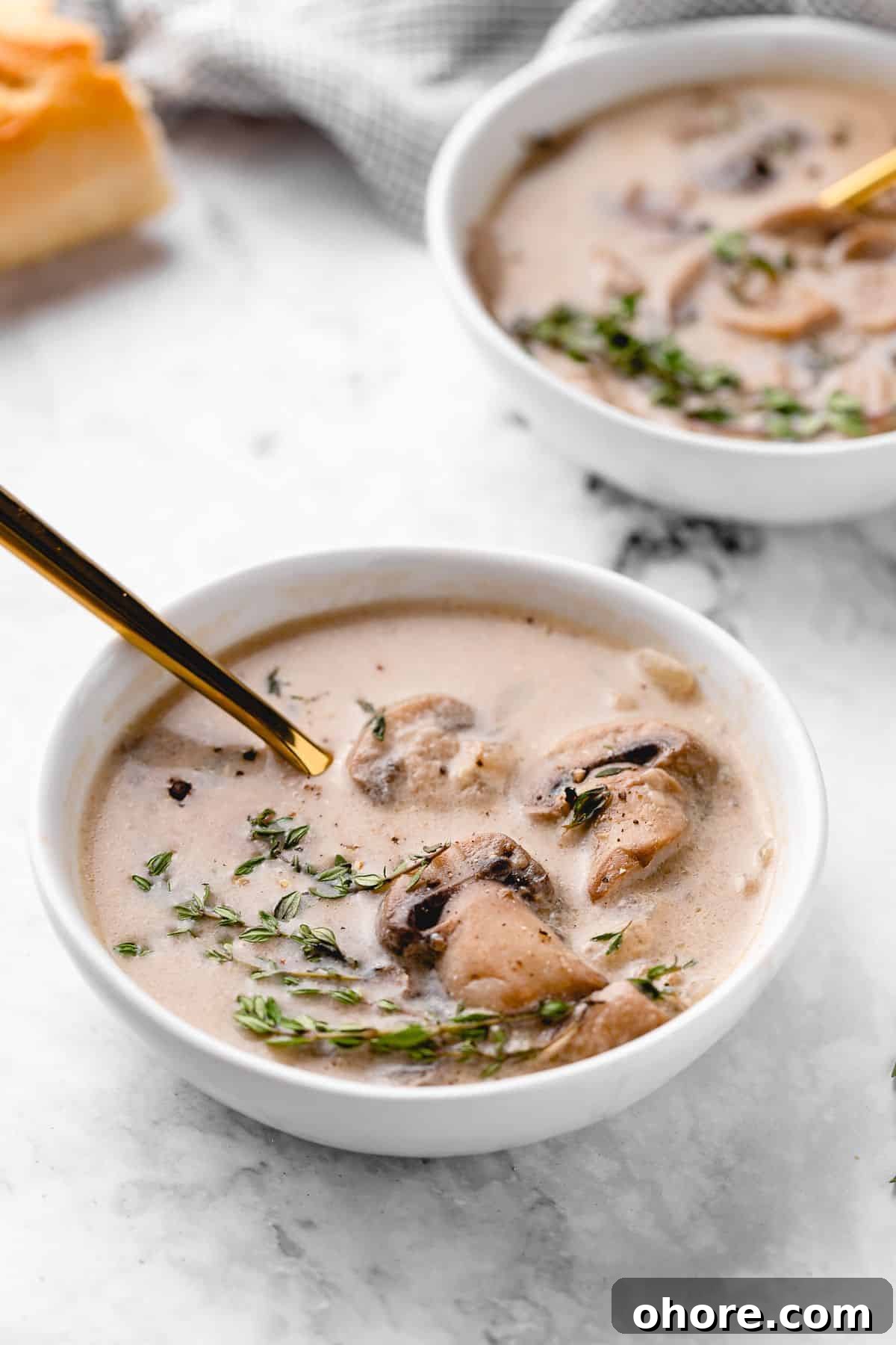 A bowl of creamy mushroom soup with a soup