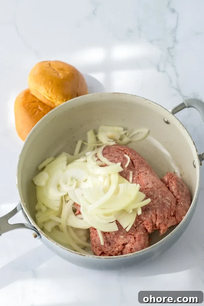 Cooking the beef and onions.
