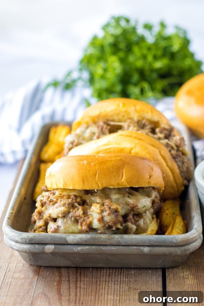 French Onion Sloppy Joes in a grey tray.