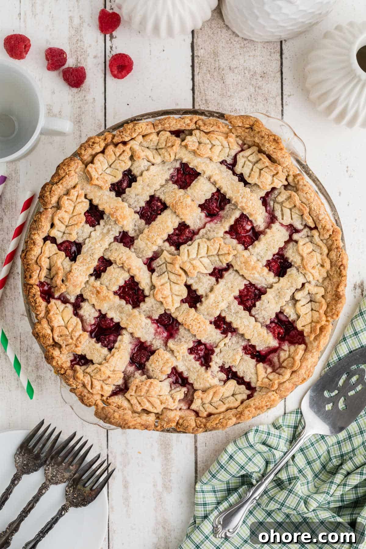 Homemade Raspberry Pie Recipe: Flaky Crust & Fresh Filling 2 Overhead portrait image of a raspberry pie.