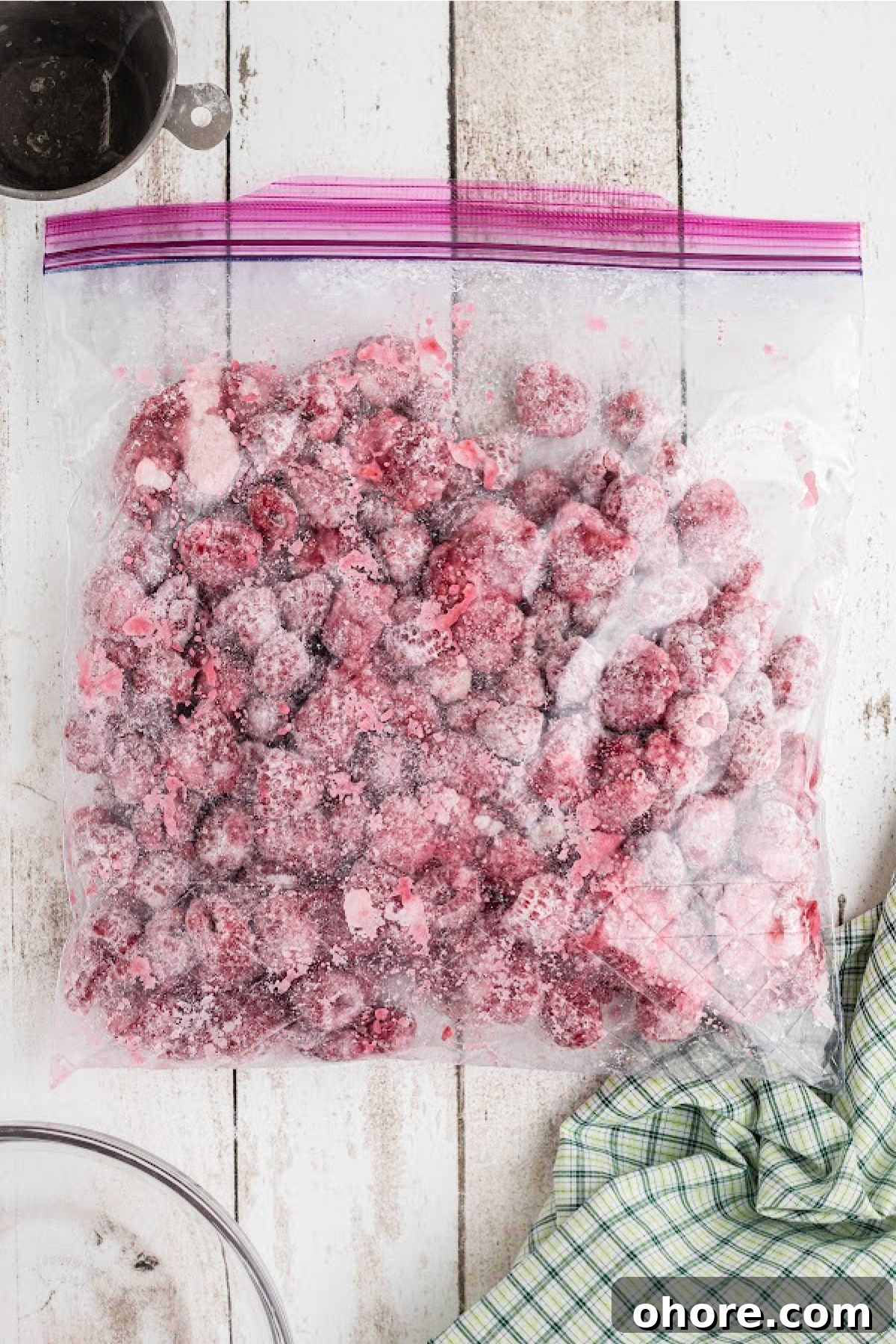 Homemade Raspberry Pie Recipe: Flaky Crust & Fresh Filling 6 A resealable bag full of raspberries, cornstarch and sugar.