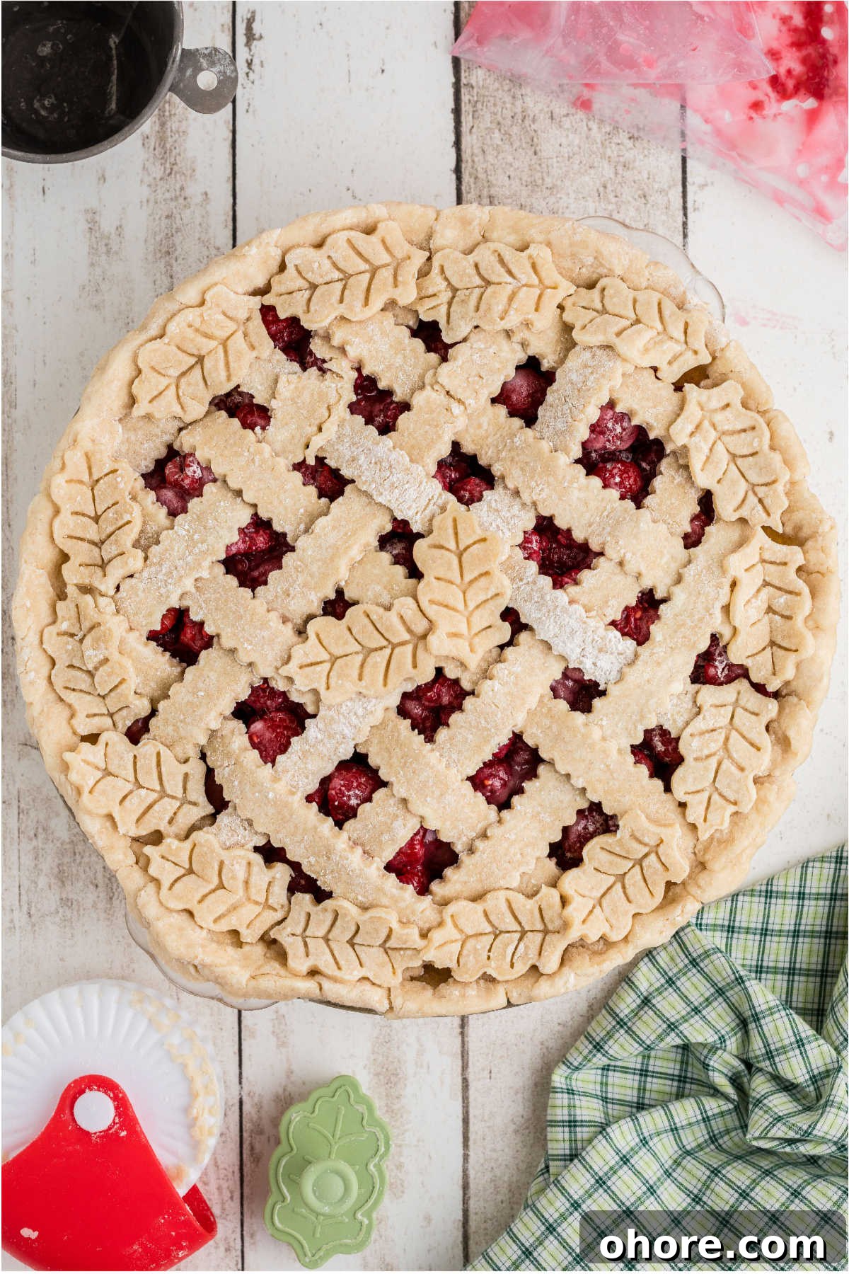 Homemade Raspberry Pie Recipe: Flaky Crust & Fresh Filling 9 A pie decorated beautifully with pastry ready to be baked.