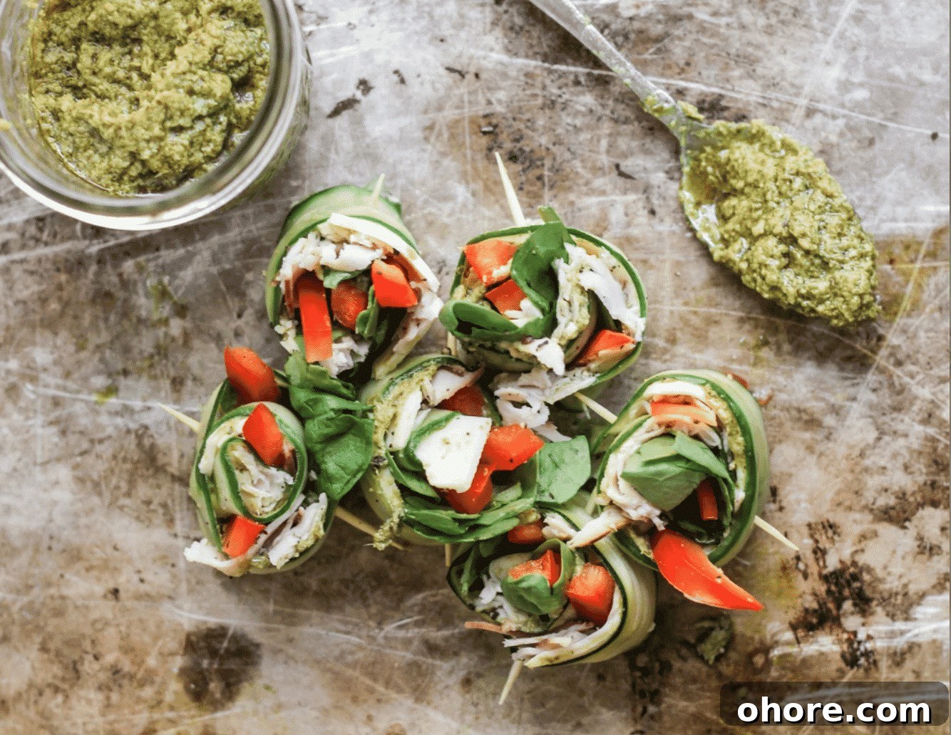 Nutritious Lunch Recipes to Support Weight Loss Goals 5 cucumbers rolled with bowl of pesto