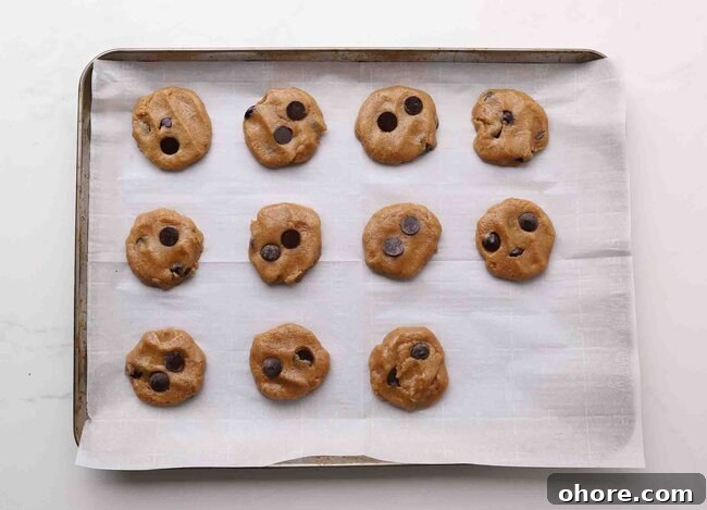 Unbaked cookies on a baking sheet.