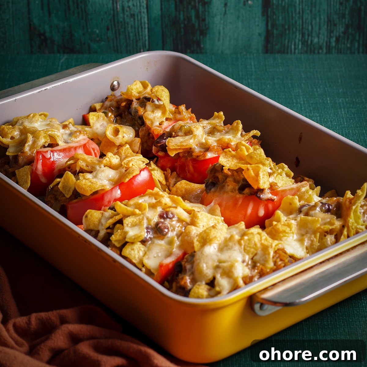 A pan of freshly baked meatless stuffed peppers, ready to eat.