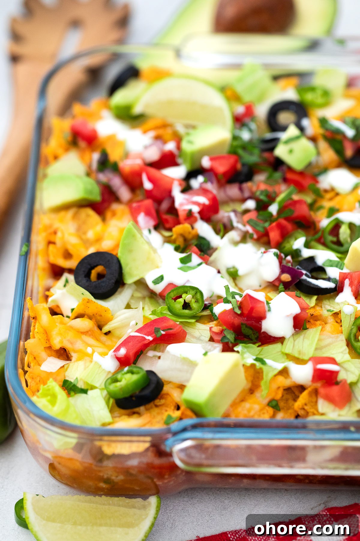 Festive Christmas Casserole Recipes for Holiday Gatherings 2 Close up view of a Walking Taco Casserole in the casserole dish.