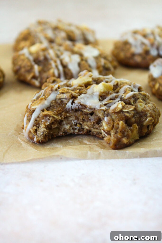 Apple Cinnamon Oatmeal Cookies recipe with warm spices and apples 4 Cookies on a tray