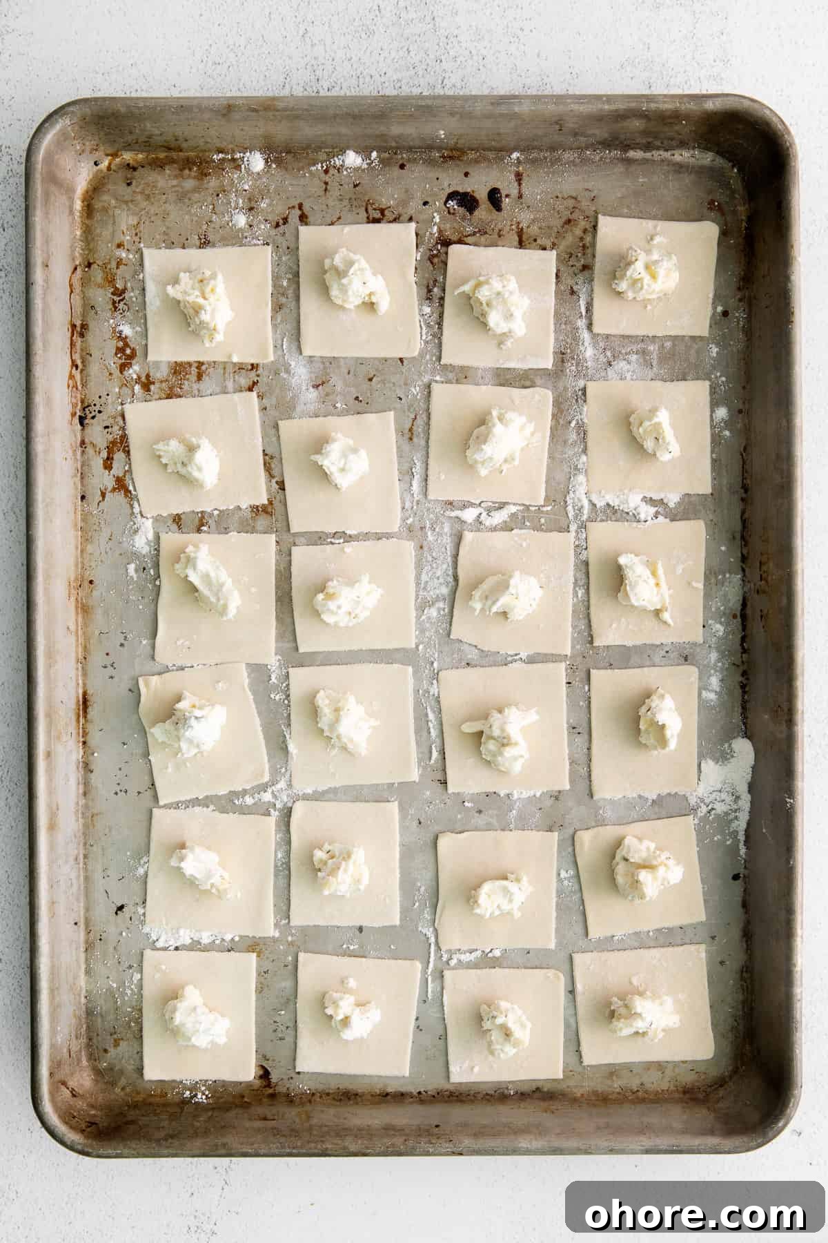 making cheese tortellini.