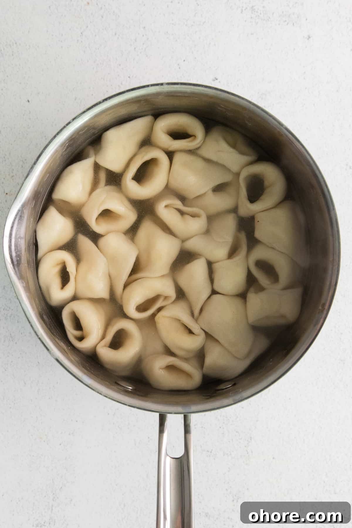 boiling cheese tortellini.