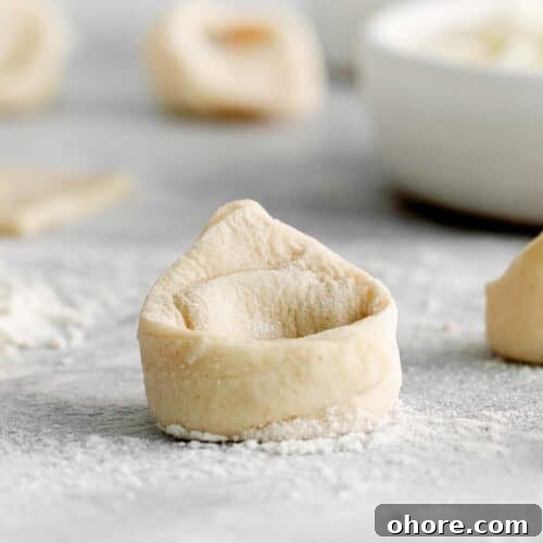tortellini on cutting board.