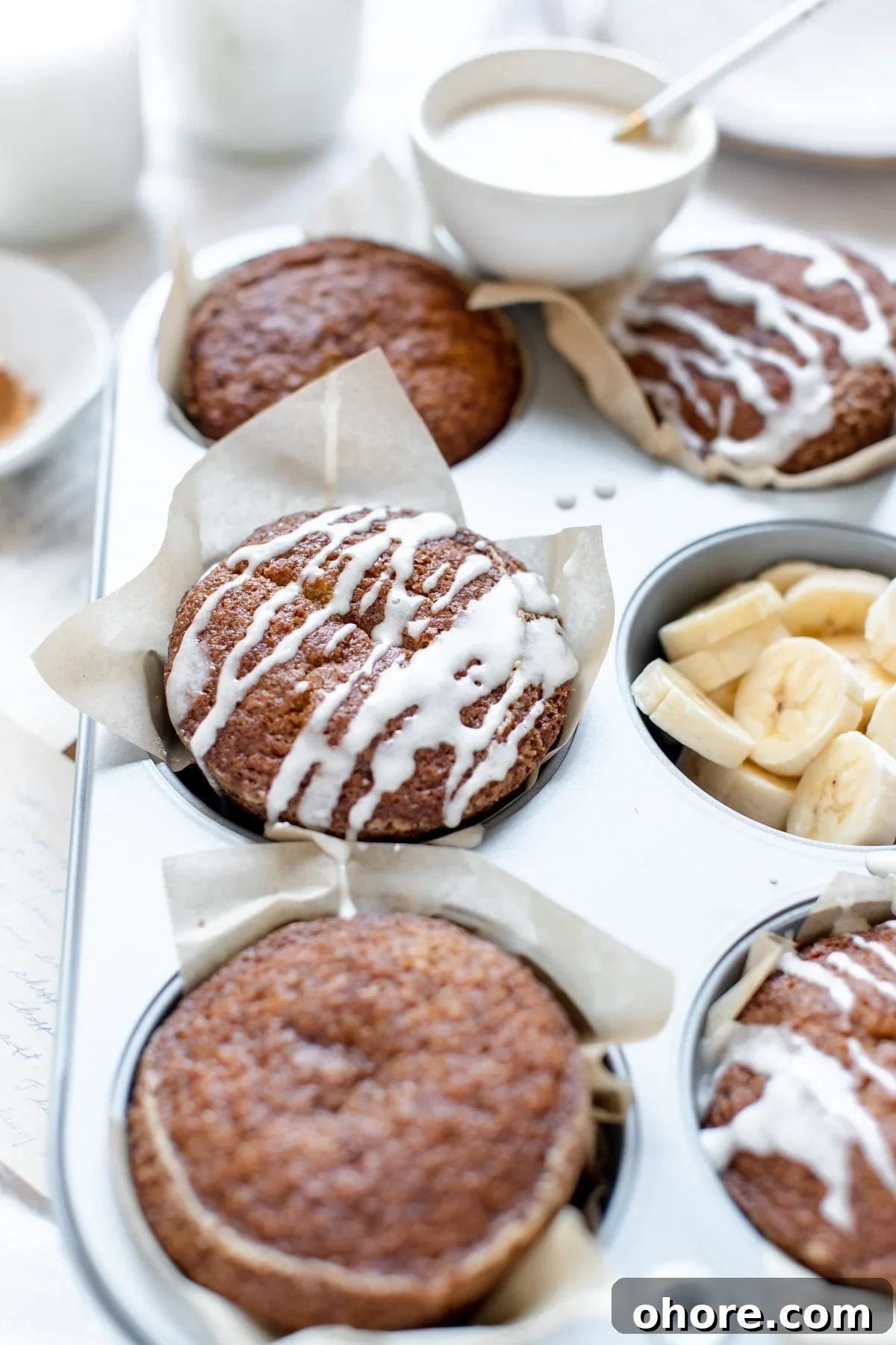 Spiced Rum Banana Muffins with a Boozy Twist 2 jumbo muffins in a muffin tin