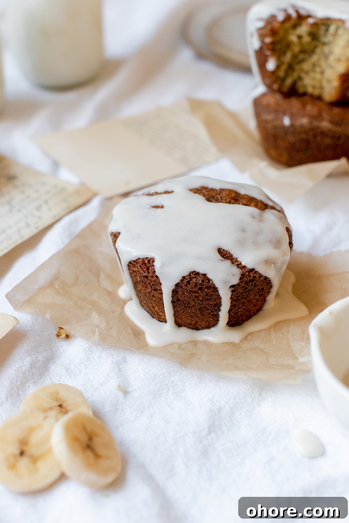 Spiced Rum Banana Muffins with a Boozy Twist 4 a muffin drizzled with glaze