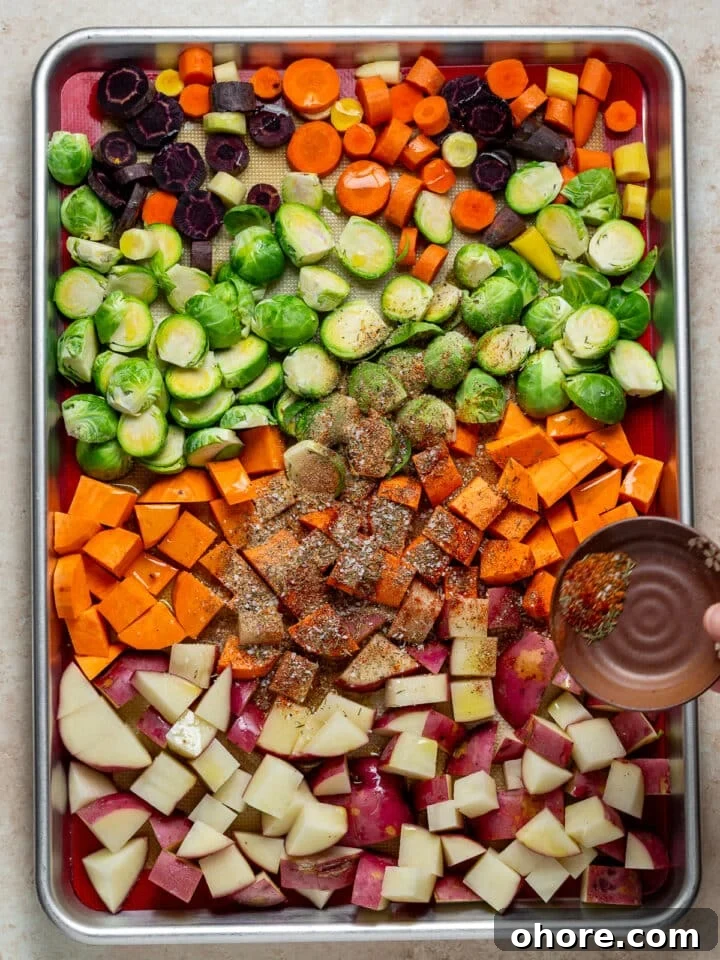 Honey-Roasted Vegetables with Miso Glaze and Crunchy Walnuts 5 seasonings and olive oil added to veggies on a sheet pan