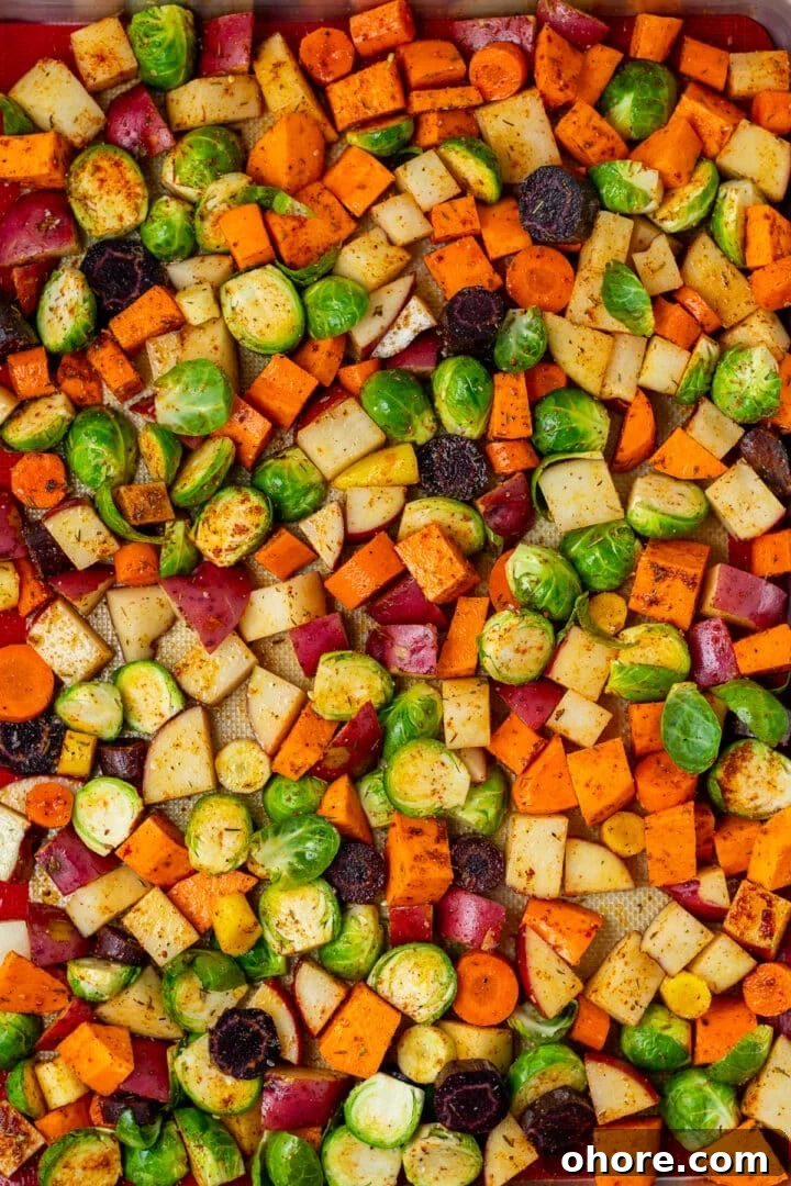 Honey-Roasted Vegetables with Miso Glaze and Crunchy Walnuts 6 raw vegetables tossed with olive oil and seasonings on a baking tray