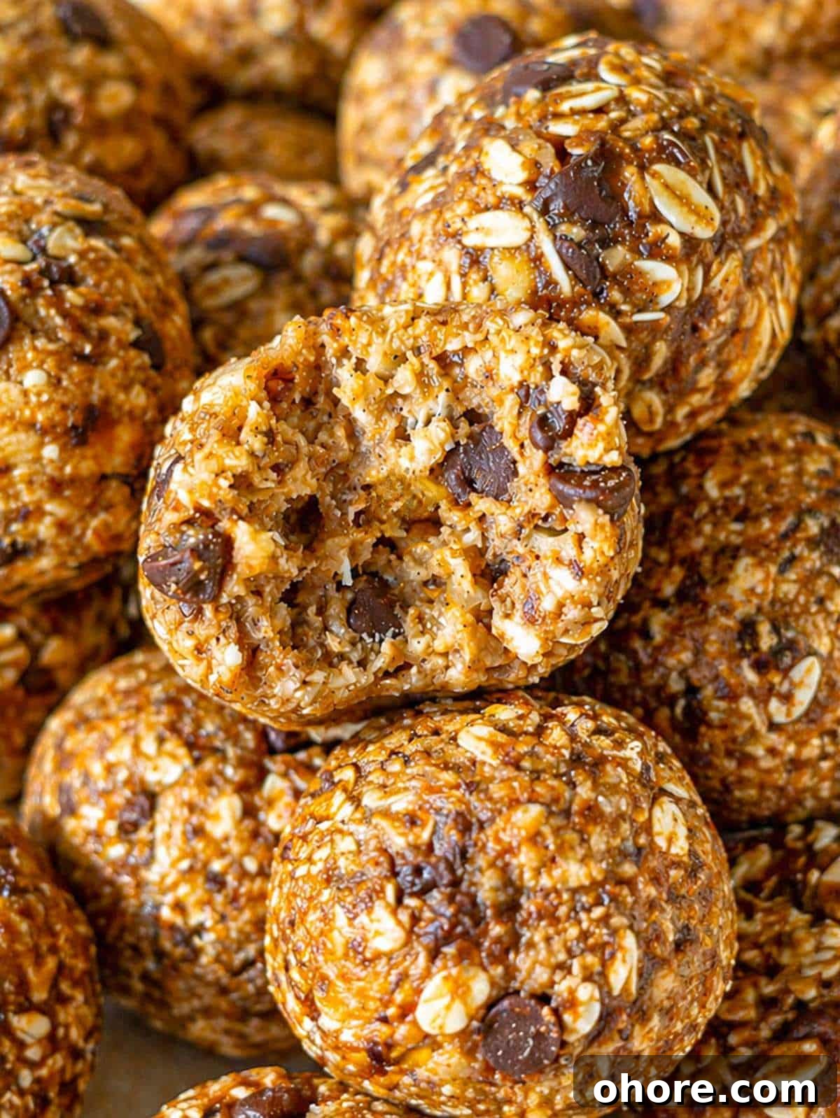 No-Bake Banana Bread Energy Balls — One-Bowl, No Blender Recipe 2 Close-up of banana bread energy ball showing soft, chewy texture and small chocolate pieces.