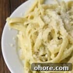 Pesto Alfredo with basil pesto in bowl