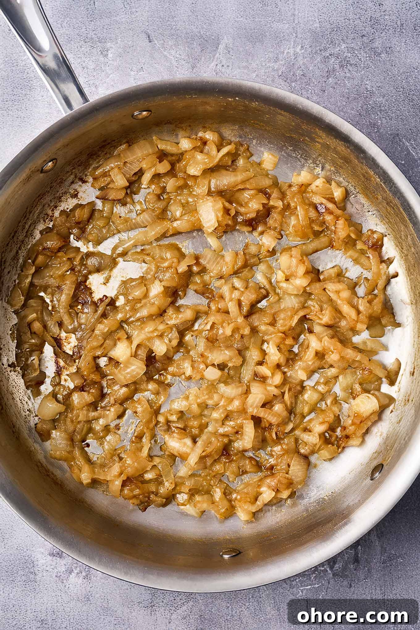 Perfect Caramelized Onions: Simple Step-by-Step Recipe 4 Caramelized onions in a stainless skillet, cooked down to a partially spreadable consistency, retaining some texture 35 to 40 minutes.