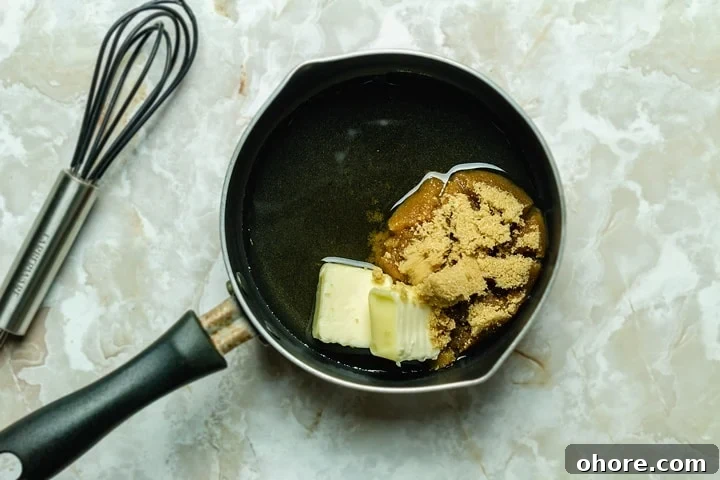 Rum and Raisin Gelato with Warm Rum Caramel Sauce 8 A small saucepan with ingredients for the rum sauce