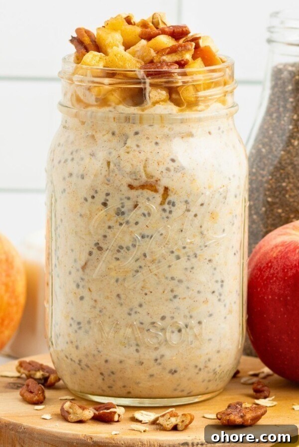 Decadent Double Chocolate Chip Muffins Recipe 9 Creamy yogurt mixed with oats and apple slices in a mason jar making apple pie overnight oats.
