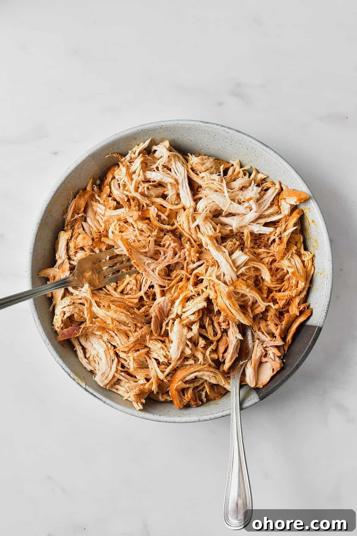 Authentic Chicken Tinga Recipe — Classic Tinga de Pollo 7 Shredded chicken.