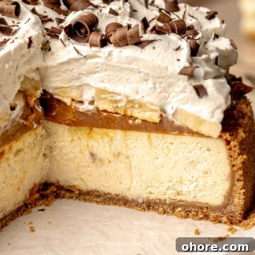 Sliced banoffee cheesecake on a platter.