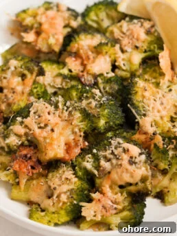 smashed broccoli parmesan in a bowl.