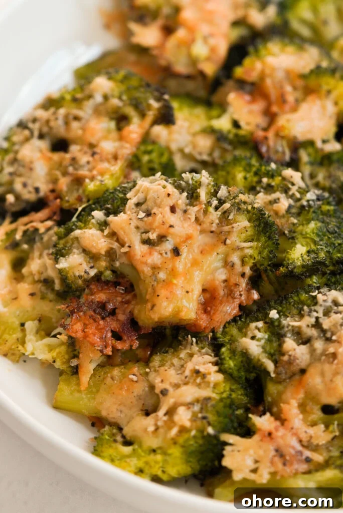 Crispy Smashed Broccoli with Parmesan and Garlic 3 cheesy smashed broccoli with parmesan cheese.