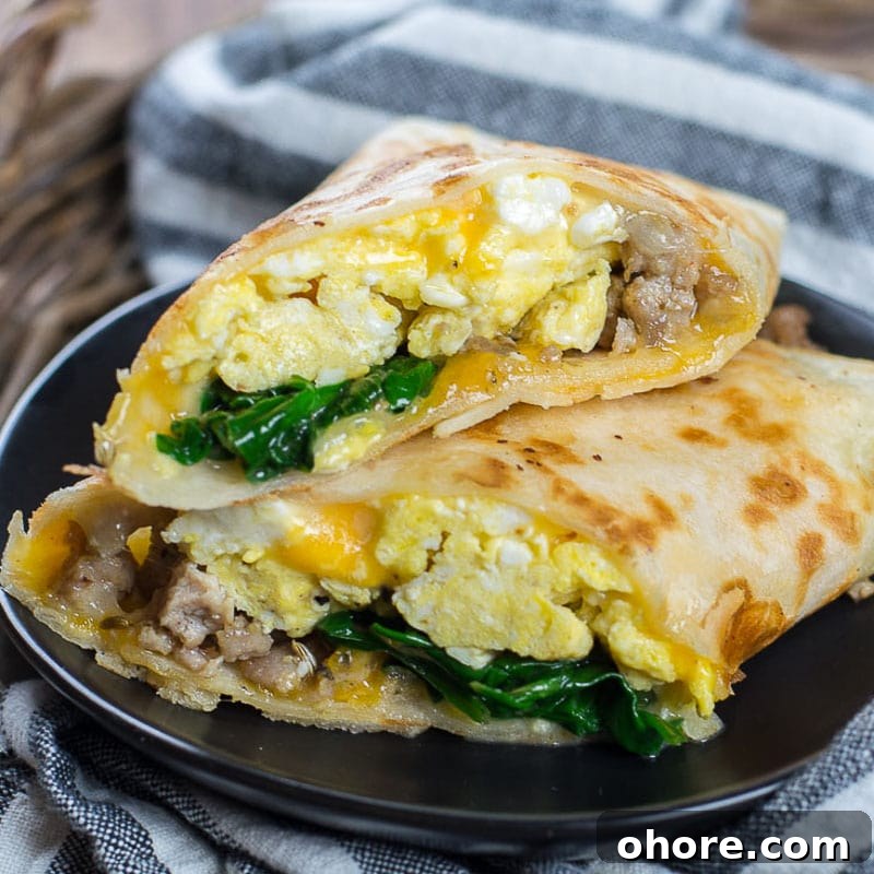 This Sausage Burrito is packed with sausage, eggs, cheese and spinach! This meal is super satisfying and is perfect for meal prep!