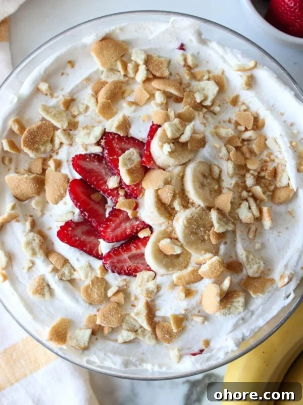 A large serving dish of strawberry banana pudding.