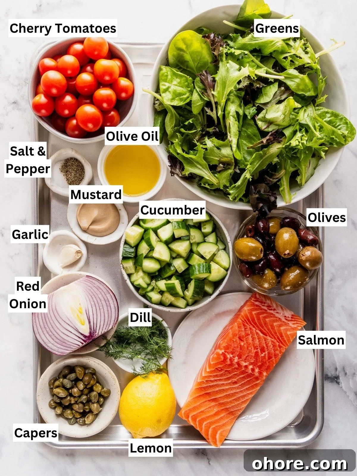 Mediterranean Salmon Salad recipe ingredients with individual labels on a metal tray.