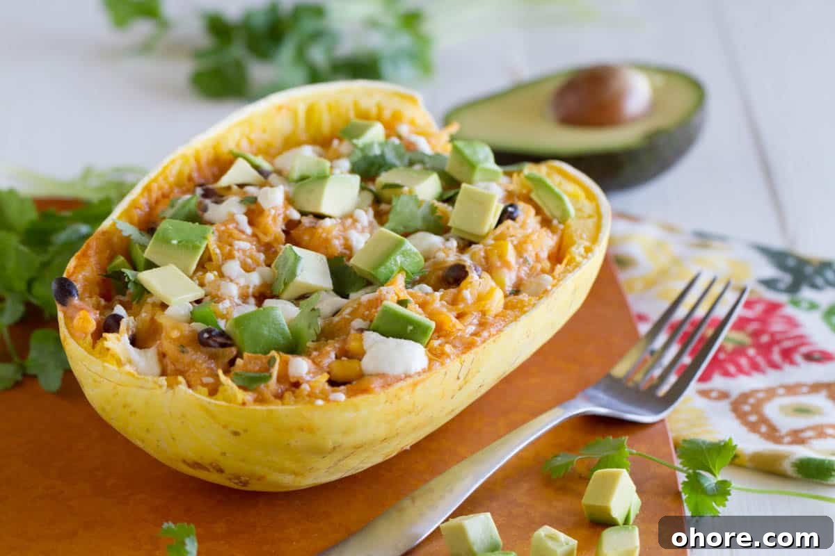 Southwestern-Stuffed Spaghetti Squash Recipe for Bold Flavor 2 Stuffed spaghetti squash with beans, corn, and cheese.