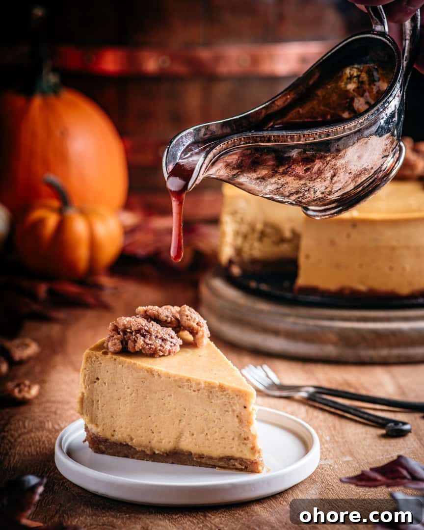 Pumpkin Cheesecake with Brown Butter Bourbon Caramel Sauce