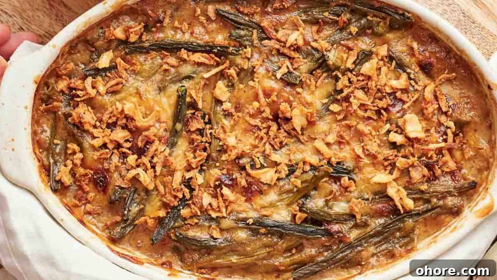 29 Cozy Air Fryer Casseroles for Warm January Dinners 4 A white dish with green bean casserole in it.