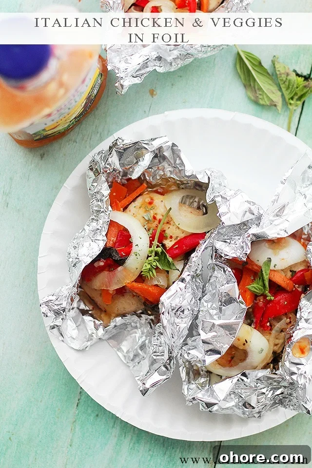 Italian Chicken and Vegetables In Foil | Flavorful, incredibly moist chicken baked in foil with peppers, onion, garlic, fresh herbs and Italian Dressing. Italian Chicken and Vegetables In Foil | Flavorful, incredibly moist chicken baked in foil with peppers, onion, garlic, fresh herbs and Italian Dressing.