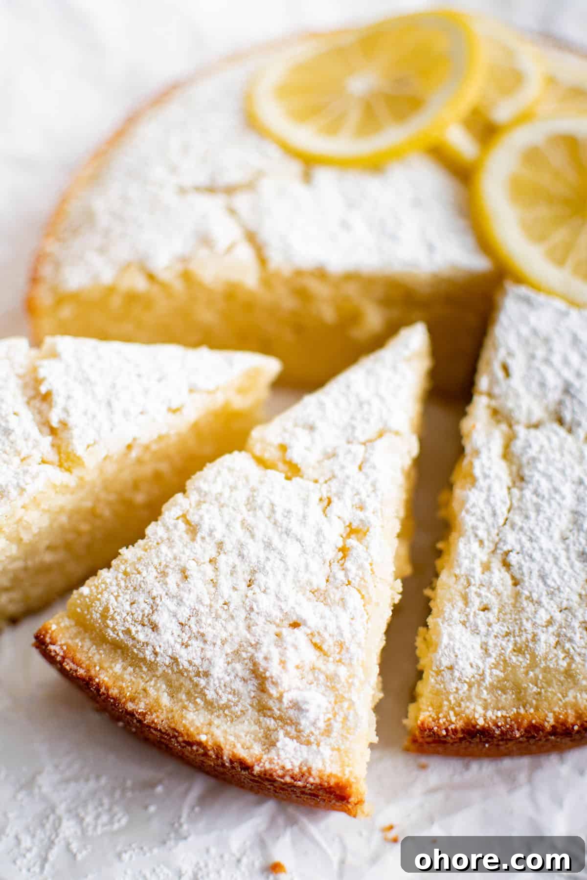 Moist Olive Oil Cake Recipe with Lemon Glaze 2 photo of slices of olive oil cake with lemon