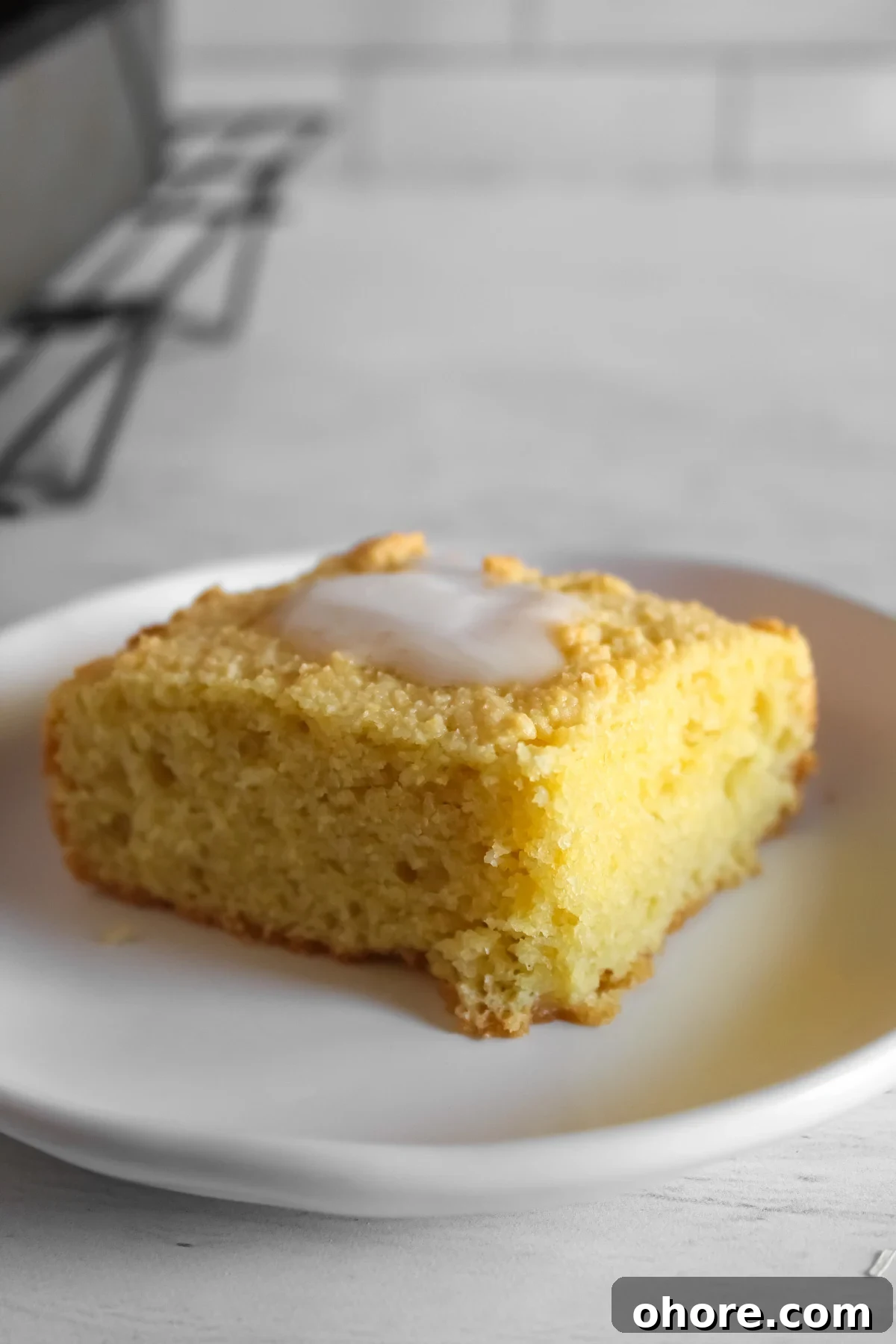 Almond Flour Cornbread: Dairy-Free, Gluten-Free Recipe 10 slice of almond flour cornbread with butter on top