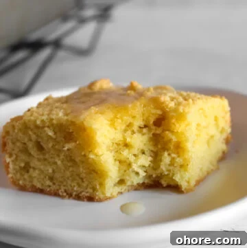 Almond Flour Cornbread: Dairy-Free, Gluten-Free Recipe 4 bite taken out of a slice of almond flour cornbread