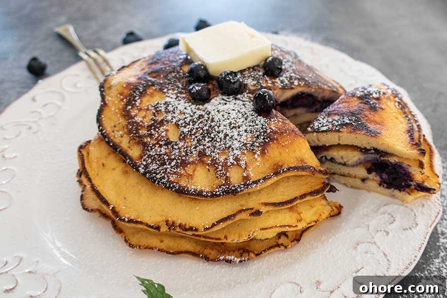 32 Gluten-Free Recipes That Support Weight Loss Goals 19 coconut flour pancakes on a plate, grain free