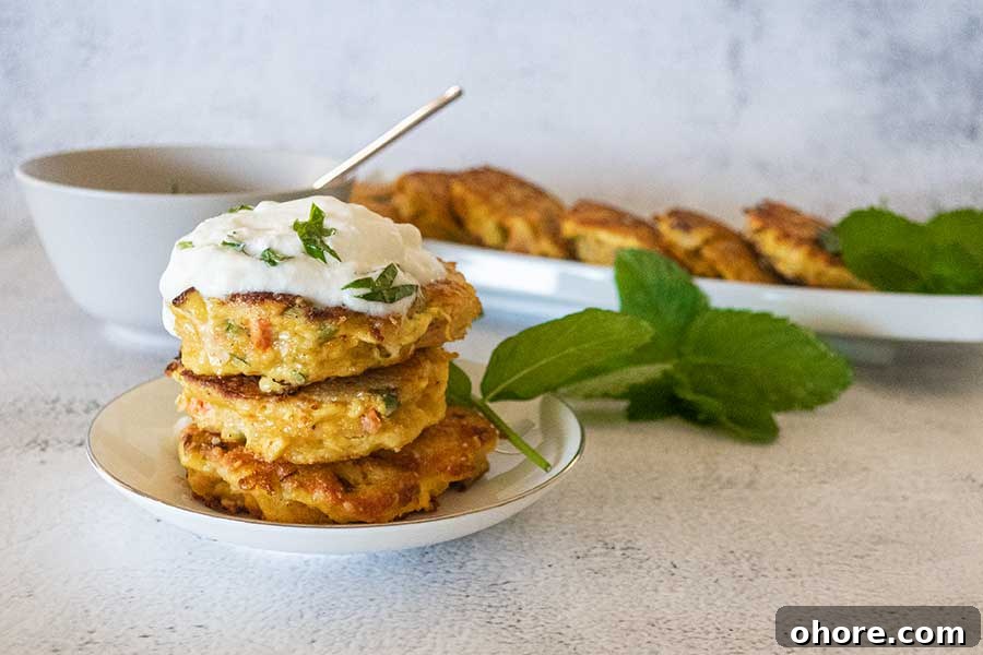 32 Gluten-Free Recipes That Support Weight Loss Goals 7 3 salmon burger patties on a plate topped with yogurt