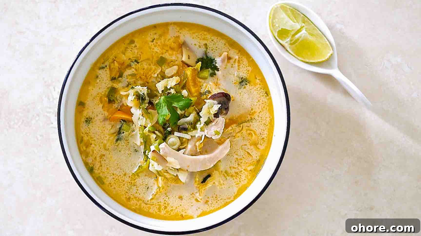 32 Gluten-Free Recipes That Support Weight Loss Goals 8 thai chicken coconut soup in a bowl for weight loss