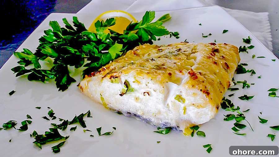 32 Gluten-Free Recipes That Support Weight Loss Goals 10 fillet of baked halibut on a plate
