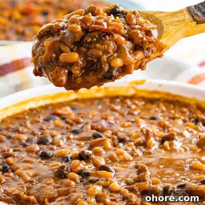 30+ Thanksgiving Recipes You Can Make in an Instant Pot 7 Cowboy Beans that were made in the Instant Pot and scooped on a spoon.
